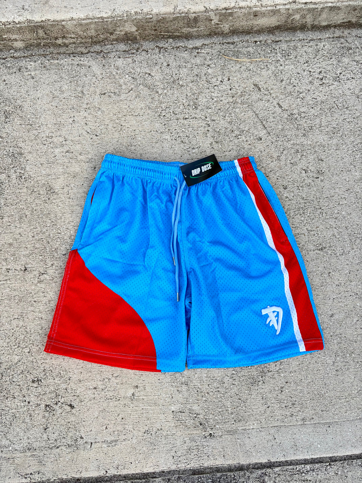 *FLAG MESH SHORTS